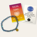 Healing stones bracelet with informational cards on a white background
